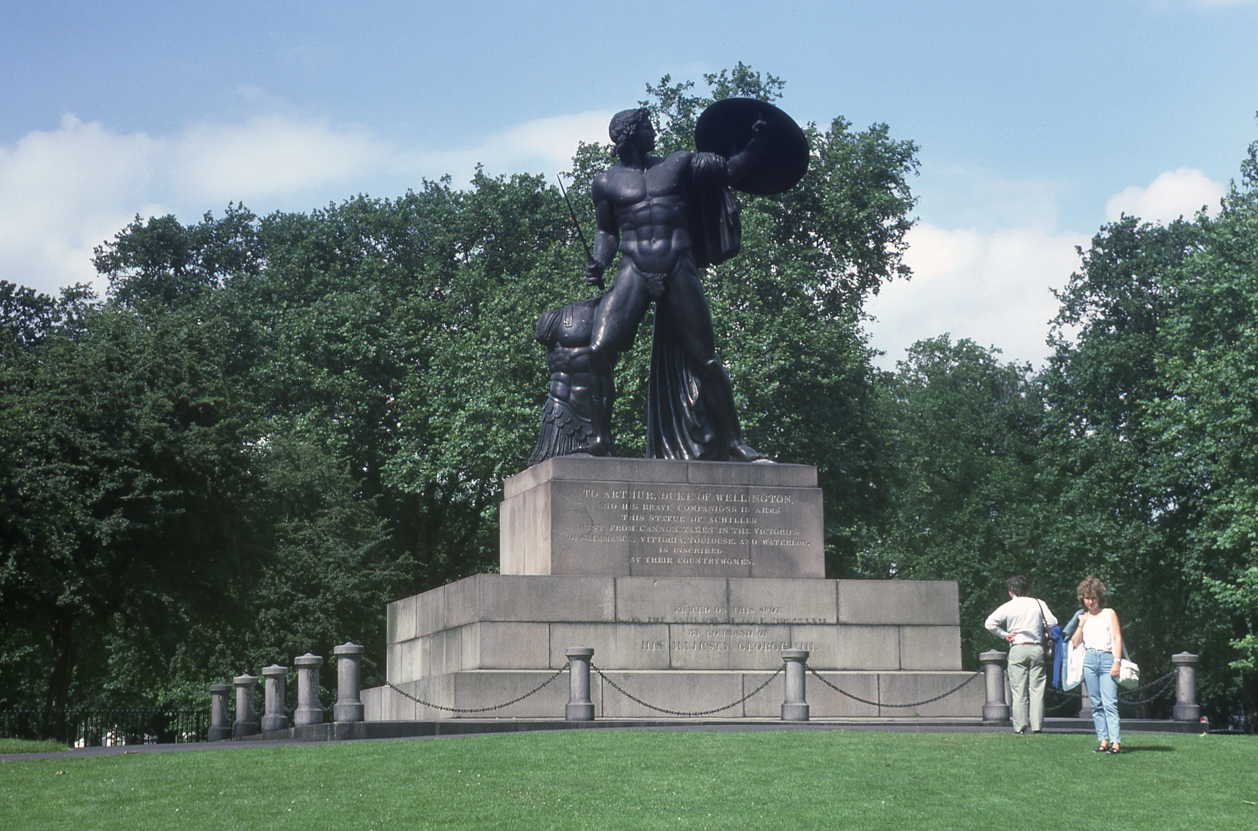 The Achilles statue surrounded by green grass
